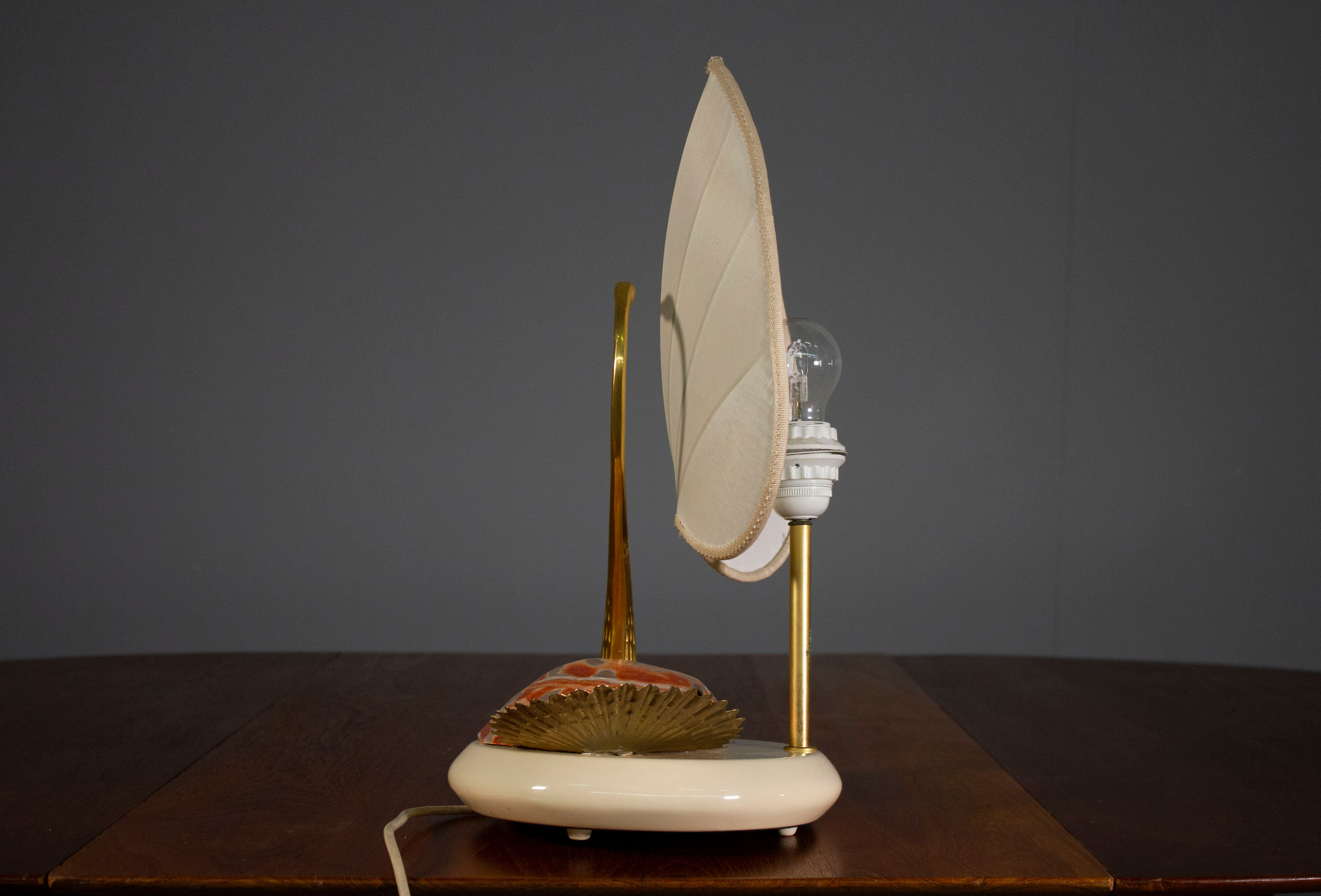 Table lamp, Cigno, made of steel and Nautilus shells, by Antonio Pavi