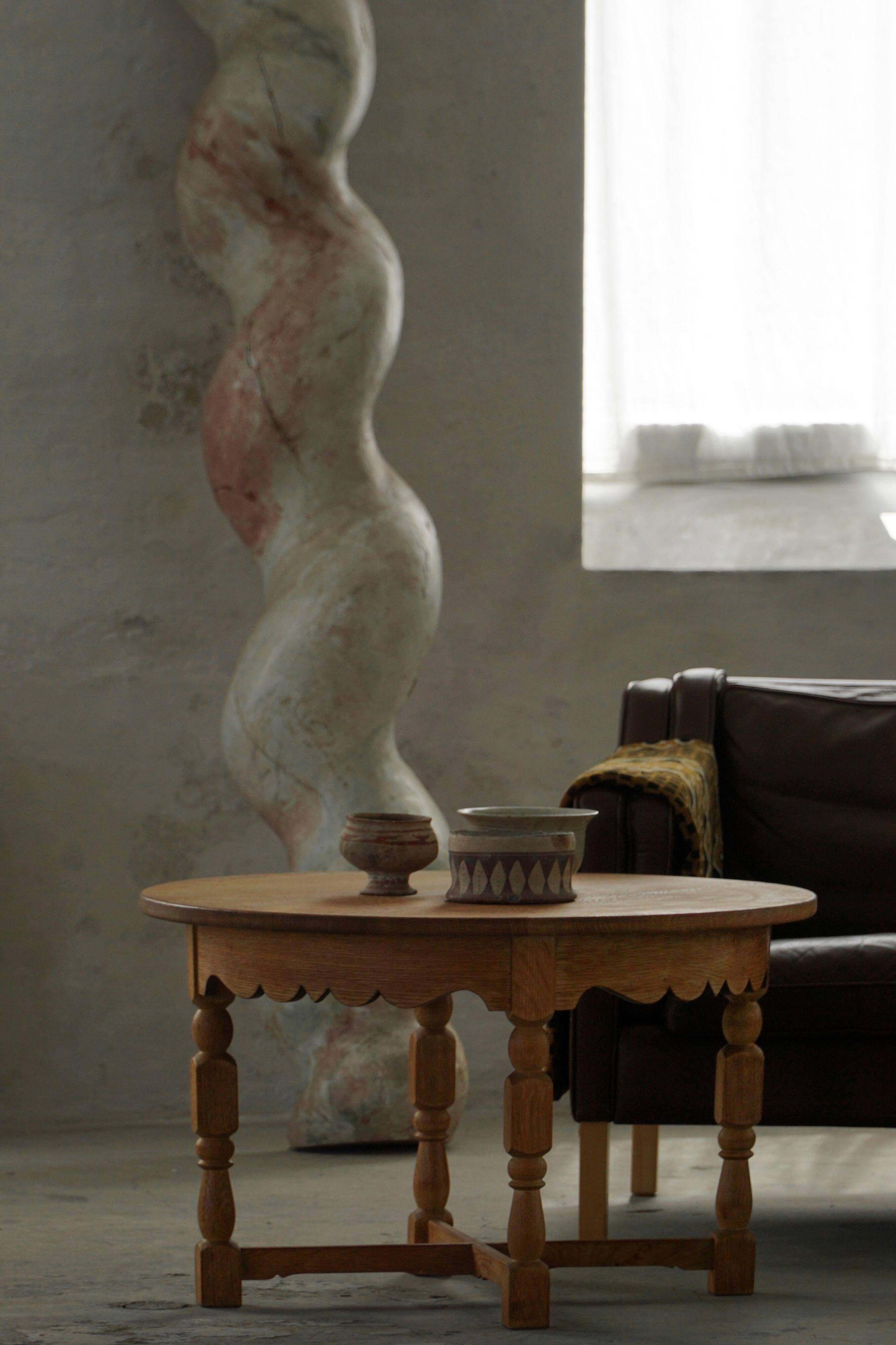 Mid-century Danish round side table in solid oak, Henning Kjærnulf, 1960s.