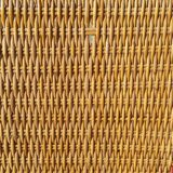 Wicker or rattan armchairs and bamboo