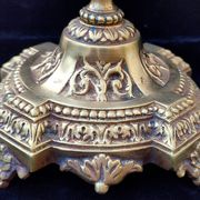 Pair of antique carved bronze candlesticks.