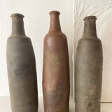 Antique terracotta cider bottles