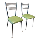 Pair of green vinyl chairs with black steel legs by Colette Gueden