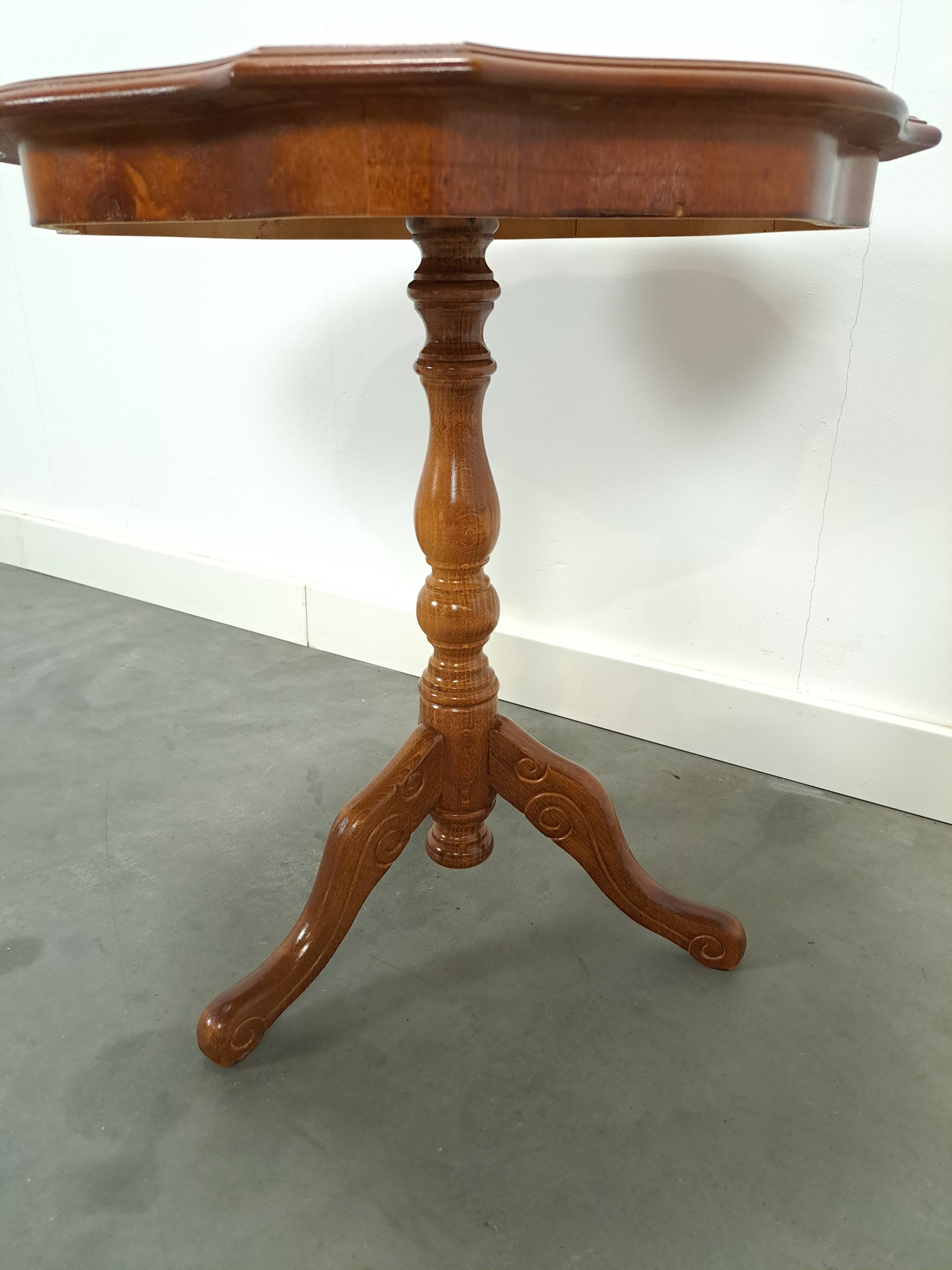 Round vintage wooden side table with inlaid veneer