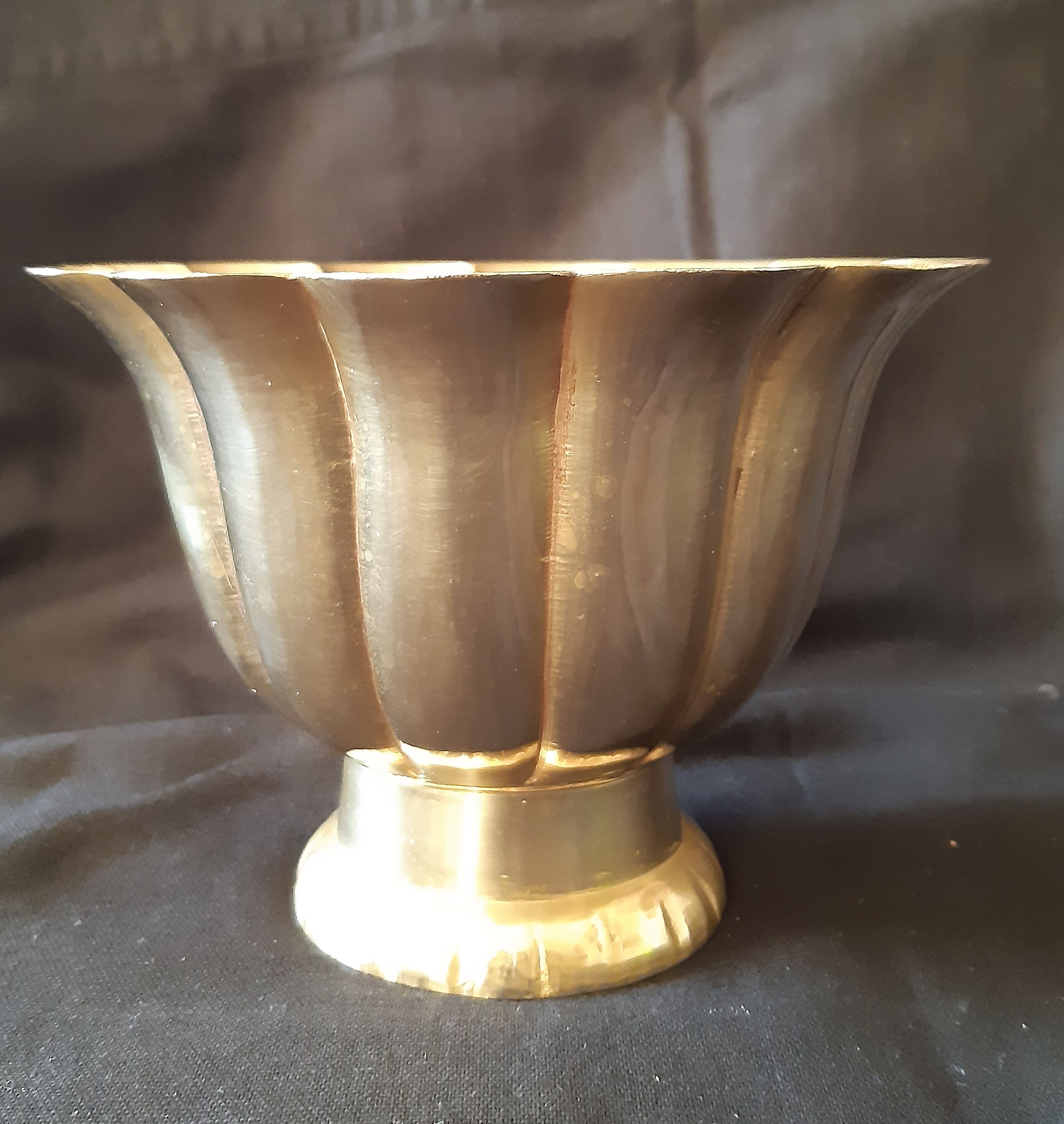 Brass pot cover