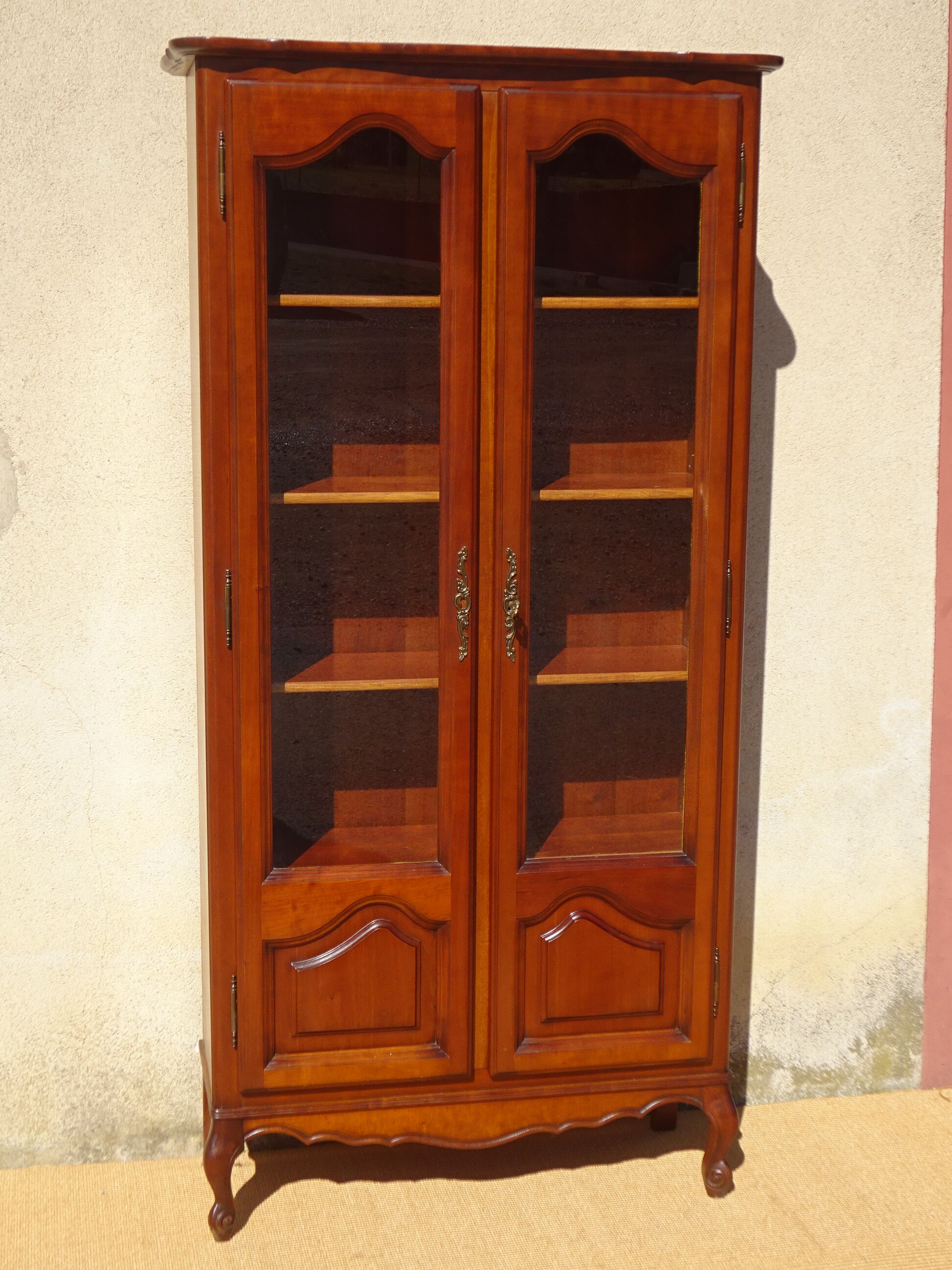 Shallow cherry wood showcase, Louis XV style