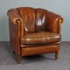 Club armchair in warm coloured sheepskin