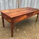 Antique farmhouse table in solid cherry wood with 3 drawers.