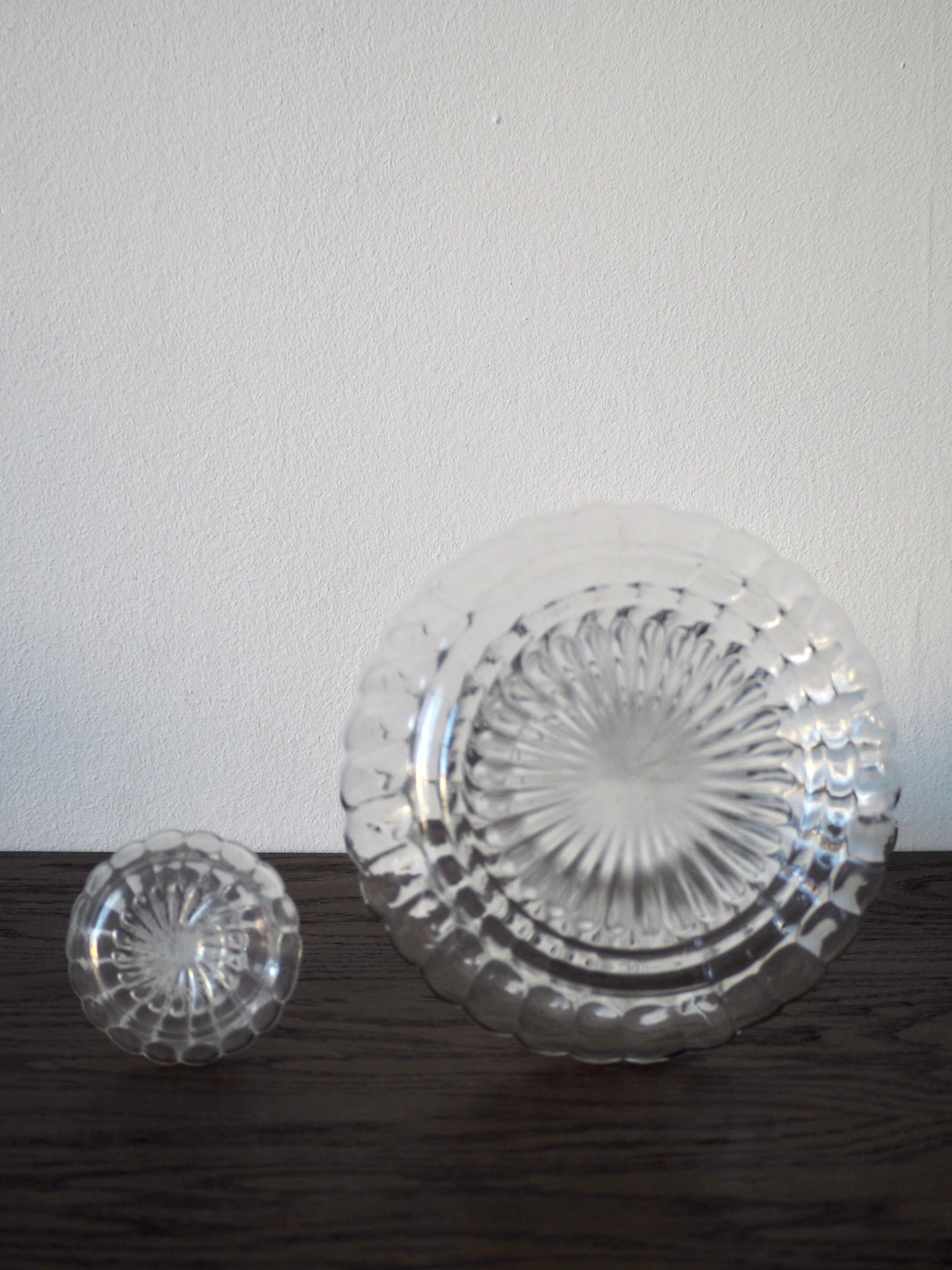 Scrolled glass wine decanter