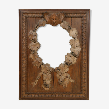Mirror of the nineteenth century in carved wood