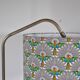 Smooth floor lamp magazine holder