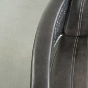 Cow leather aviator design armchair finished with aluminium and rivets