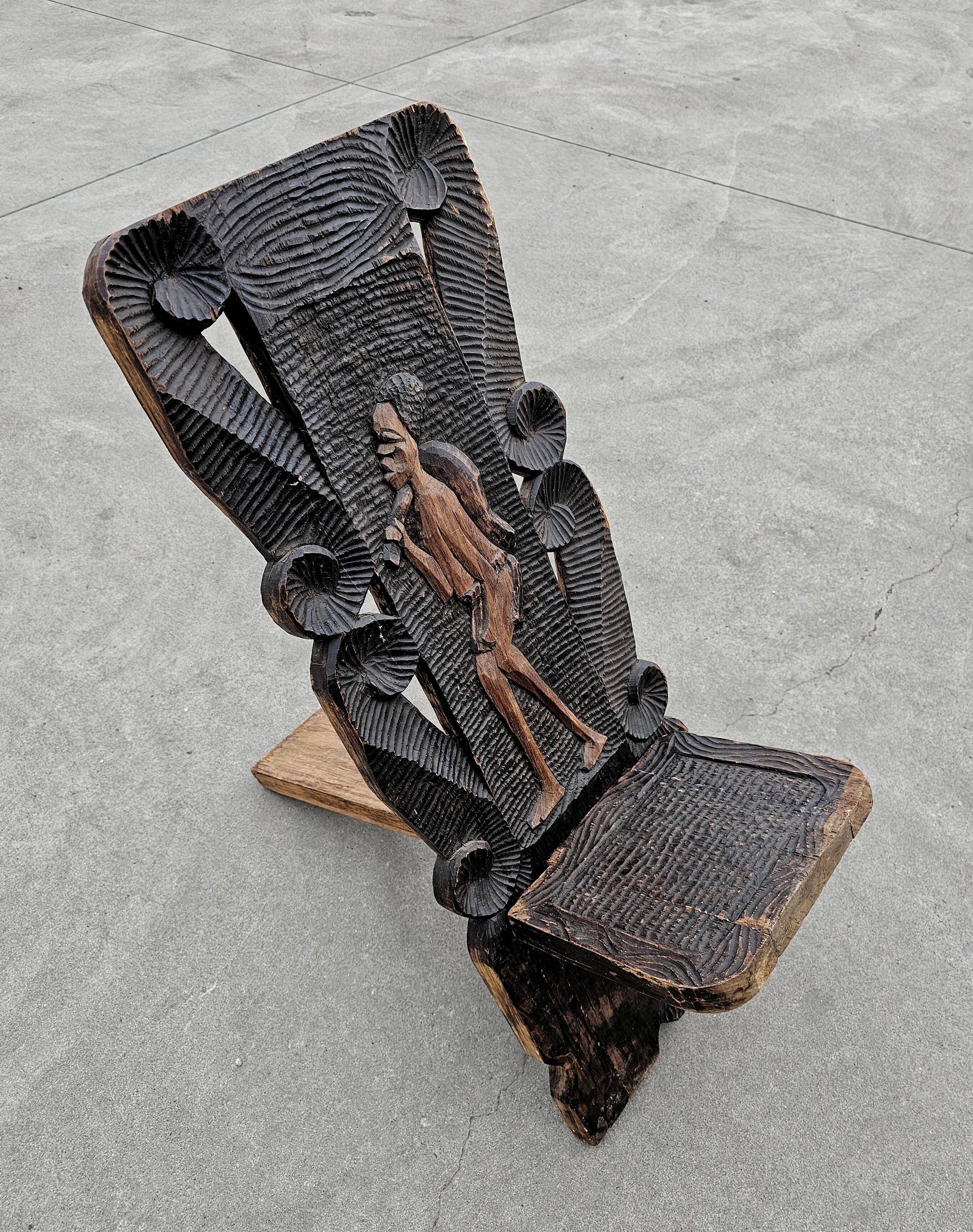 Antique carved wood Stargazer chair from the 1890s.