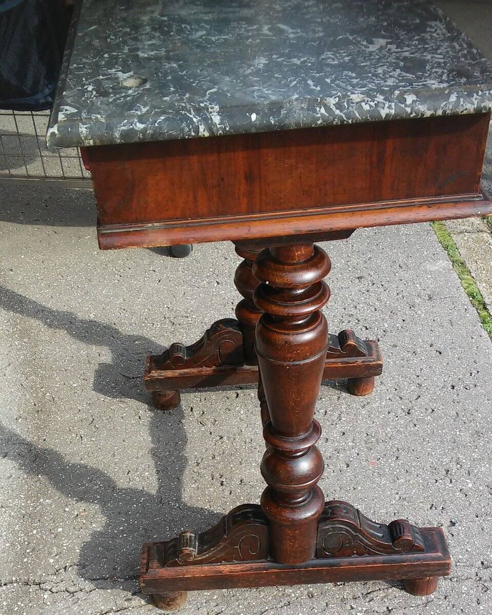 Baroque Viennese console in brown wood with a veined black marble top — late 19th century.