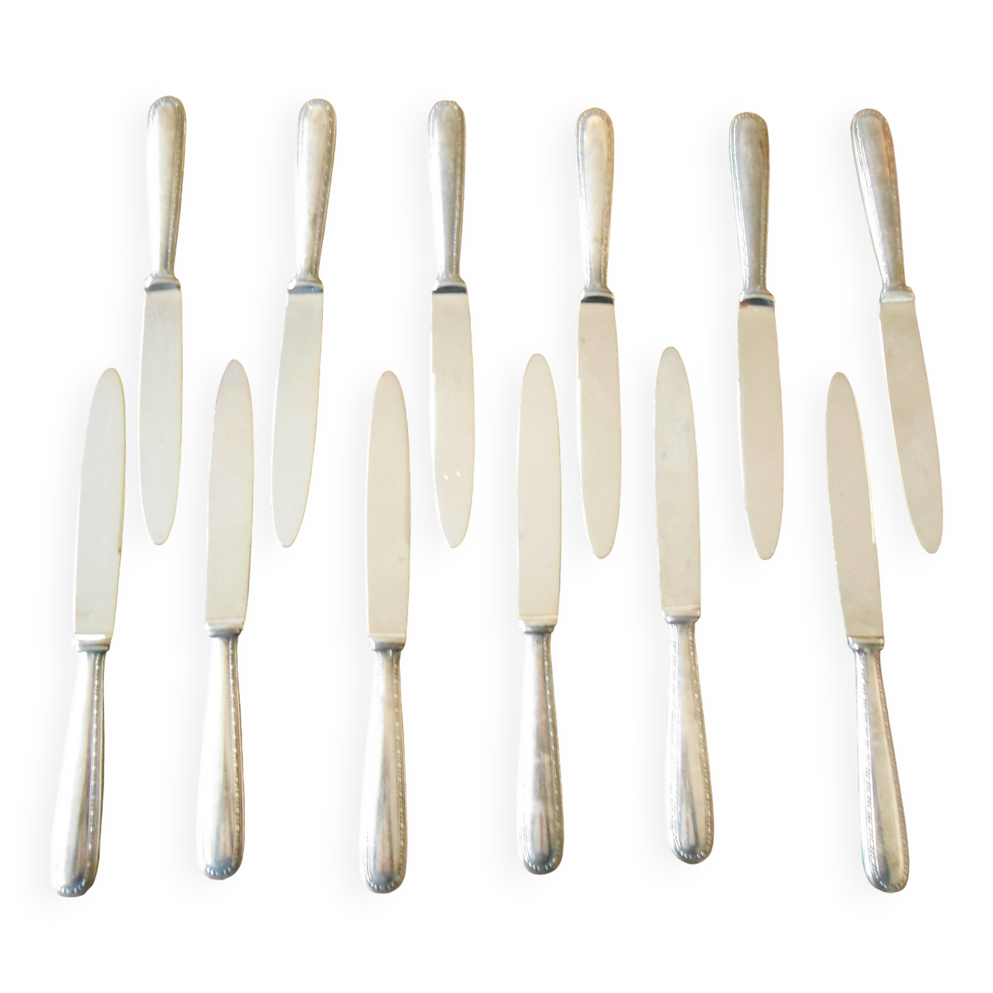11 silver metal knives