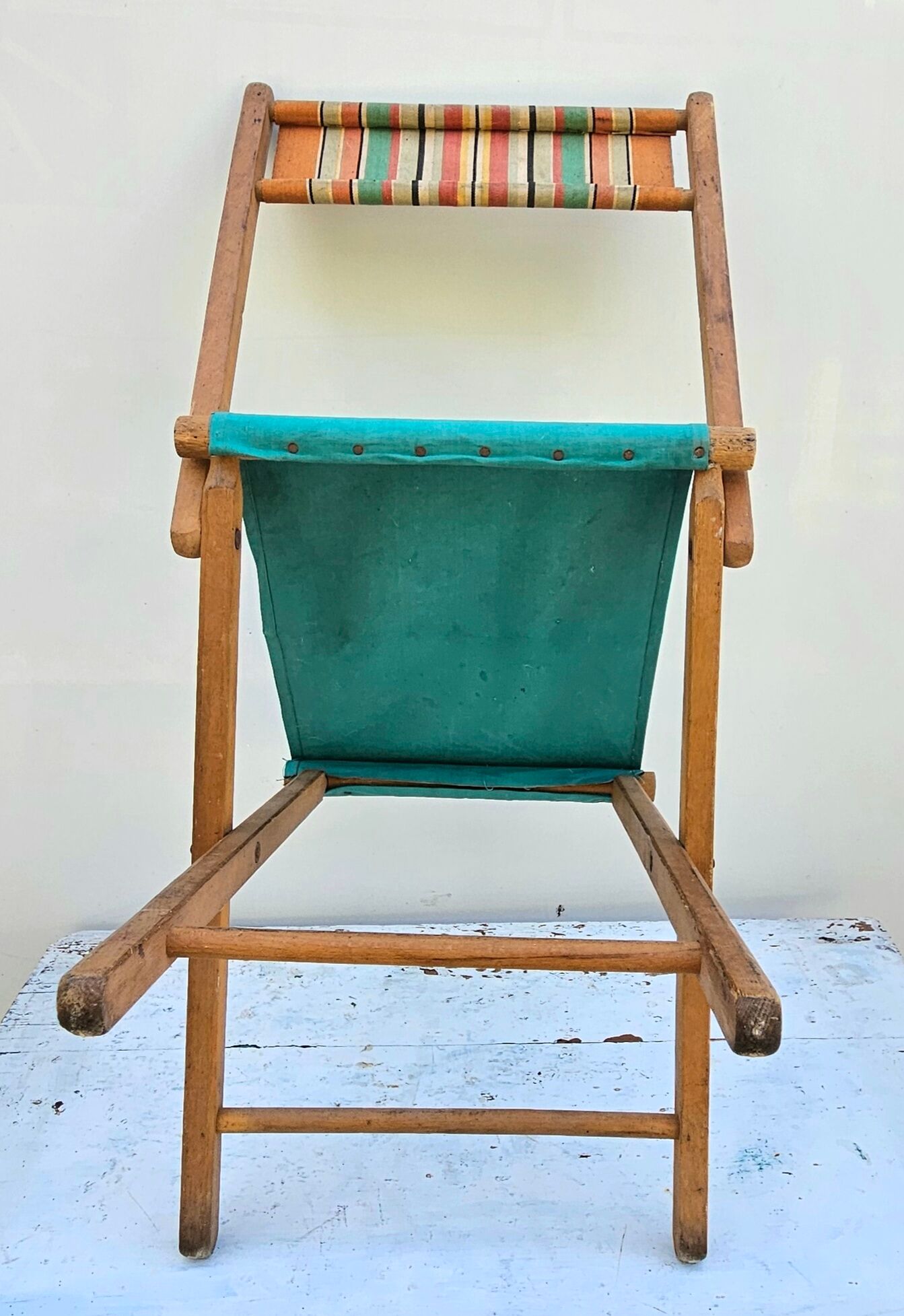 Folding fisherman's chair in wood and fabric