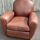 Club chair in brown leather