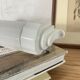 Art Deco tubular wall light in ceramic and white opaline glass tube.