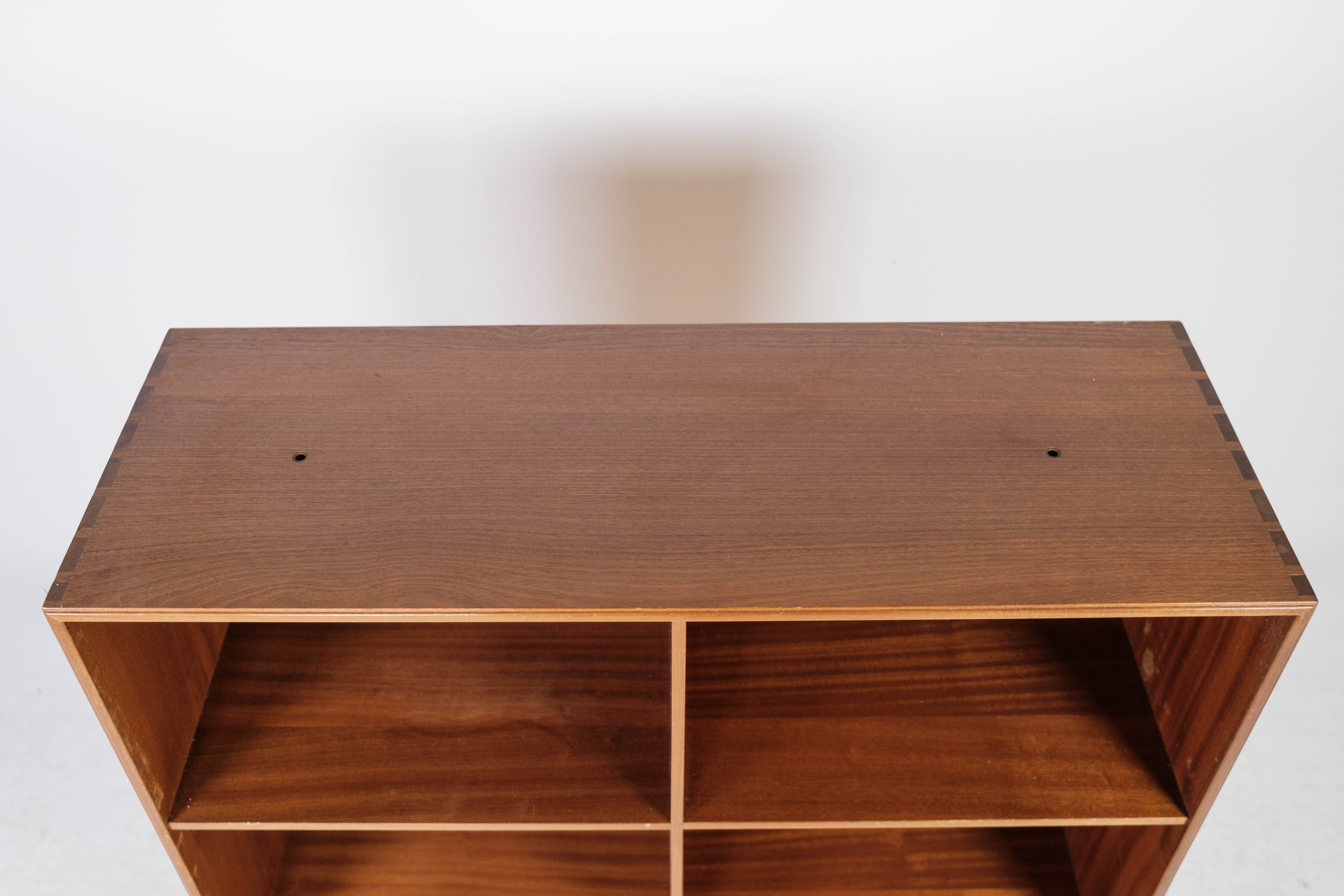 Bookcase in light mahogany designed by Mogens Koch and manufactured by Rud Rasmussen in the 1960s.