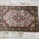 Handmade Persian wool and silk rug