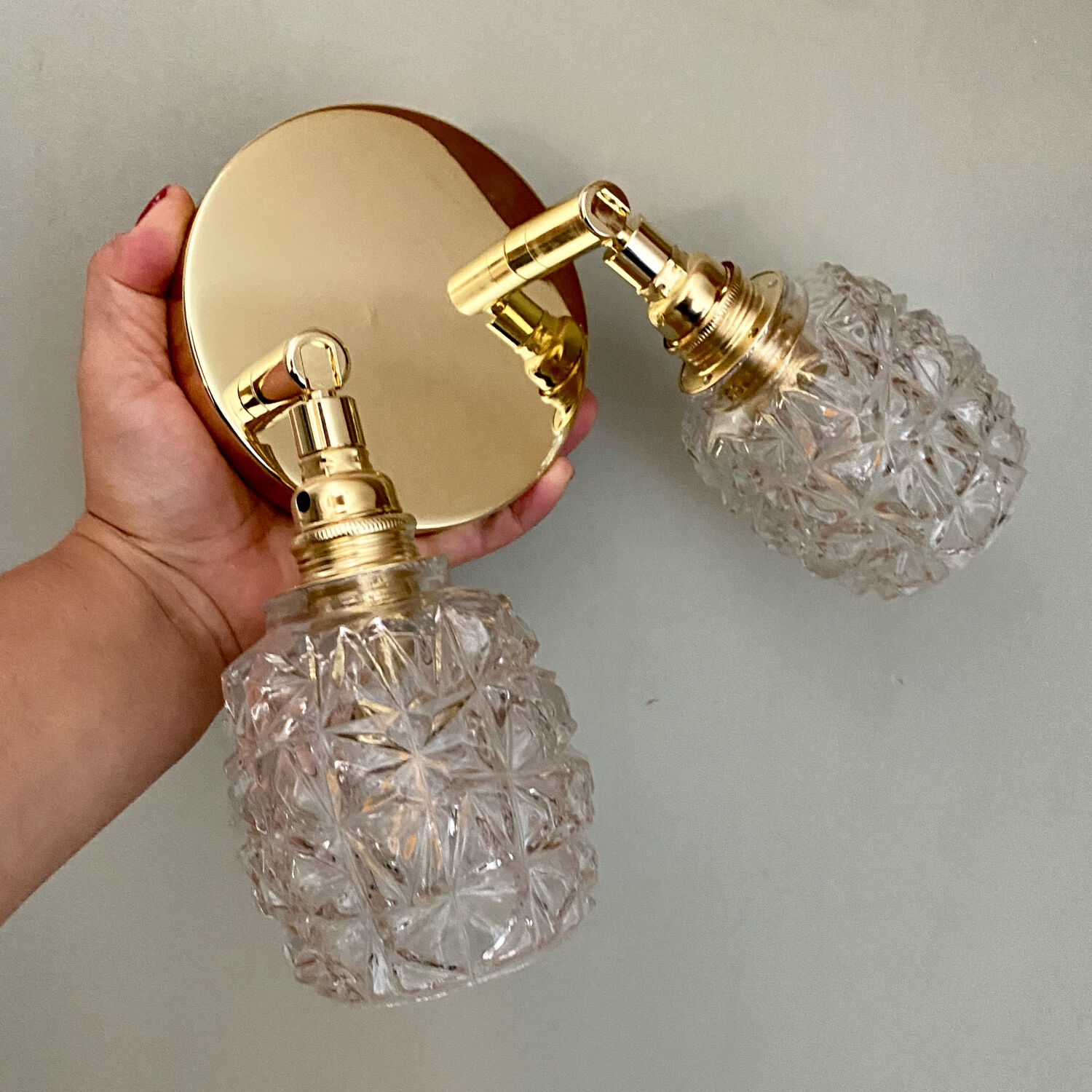 Double vintage tulip wall light in moulded glass.