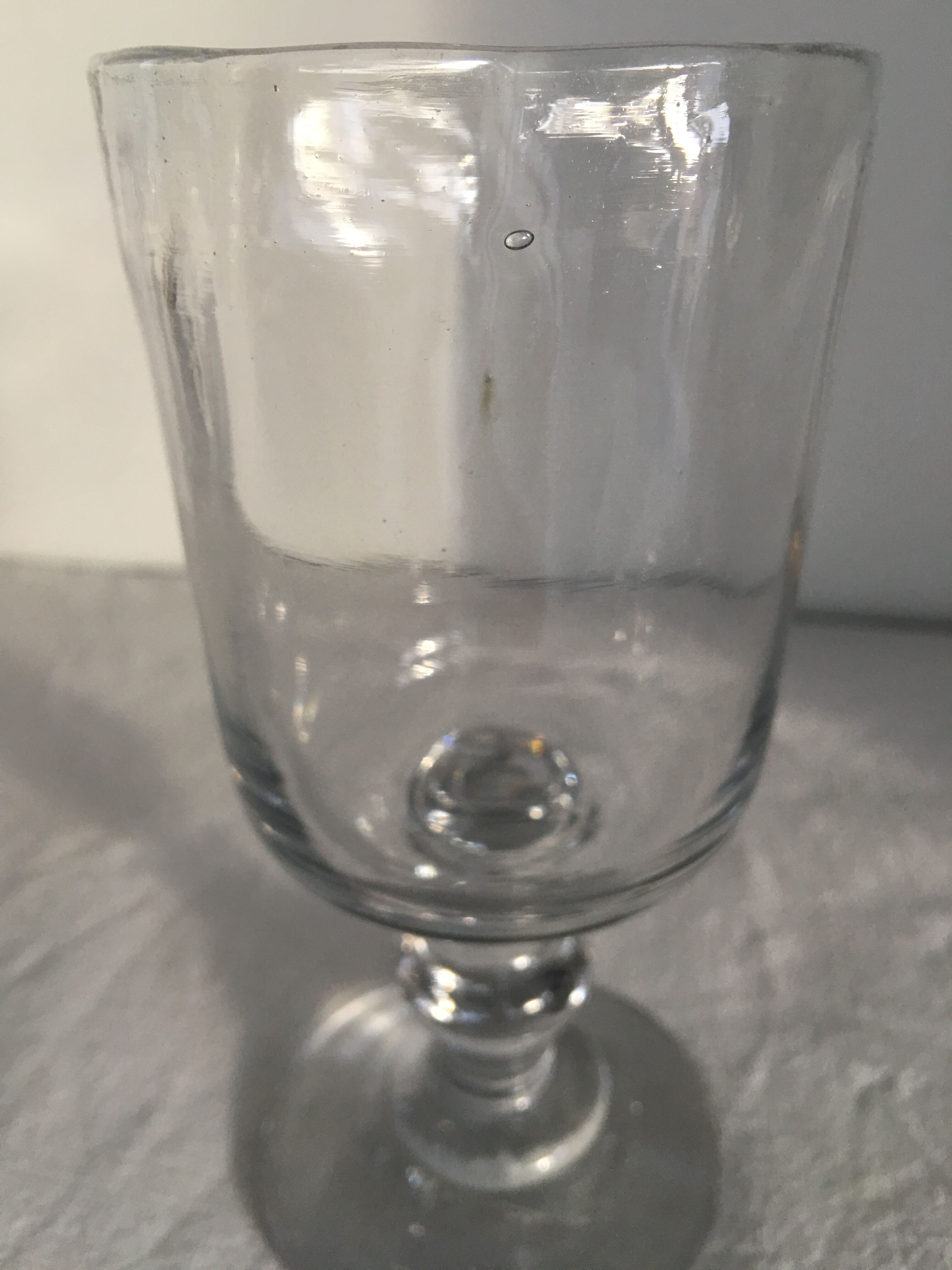 Glass on foot - blown glass bubble late nineteenth early twentieth