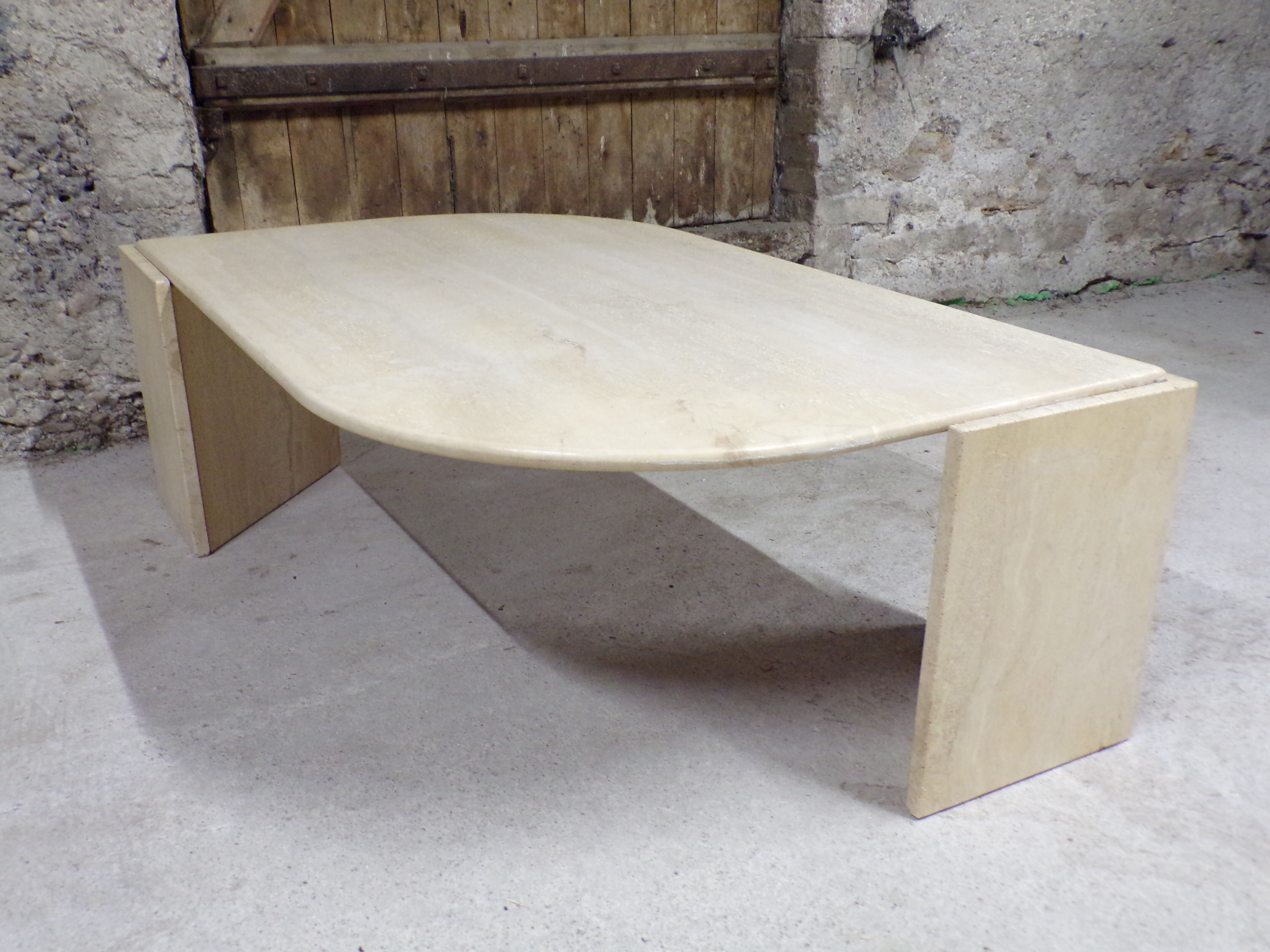 Table basse oeil en travertin 77X127 cm