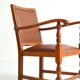 Antique brutalist oak and vinyl armchair