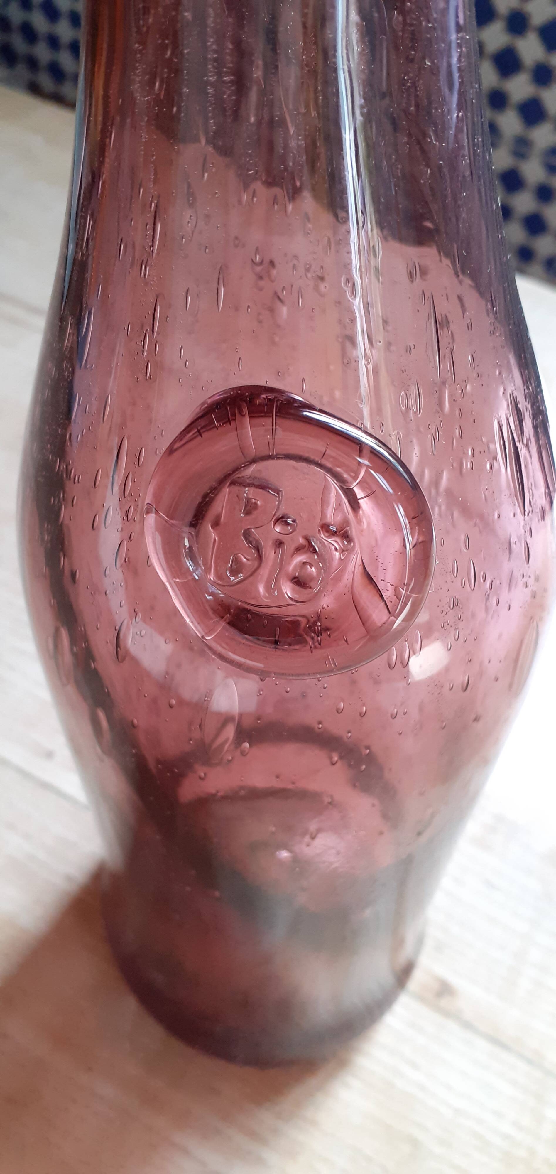 Old long Biot glass bottle