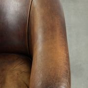 Fauteuil club en cuir de mouton vintage