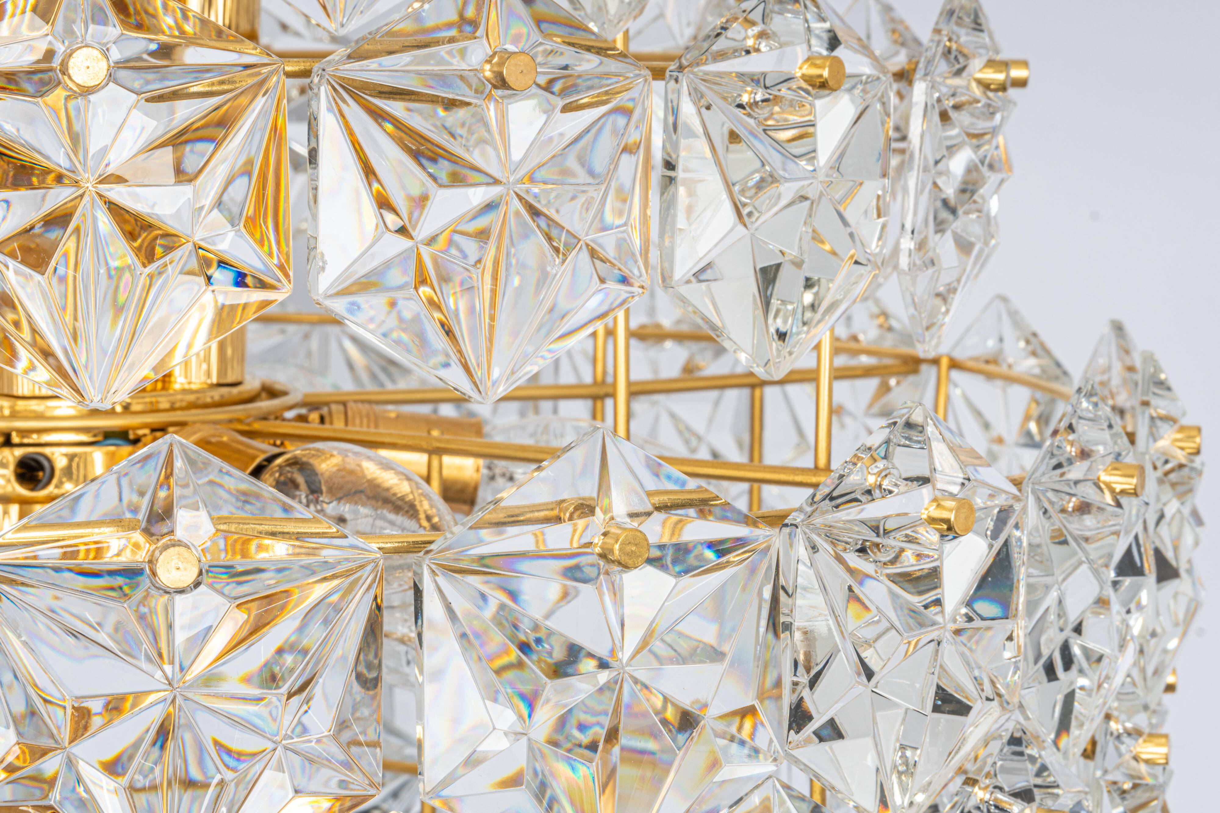 Chandelier, brass and crystal glass by Kinkeldey, Germany, 1970s.