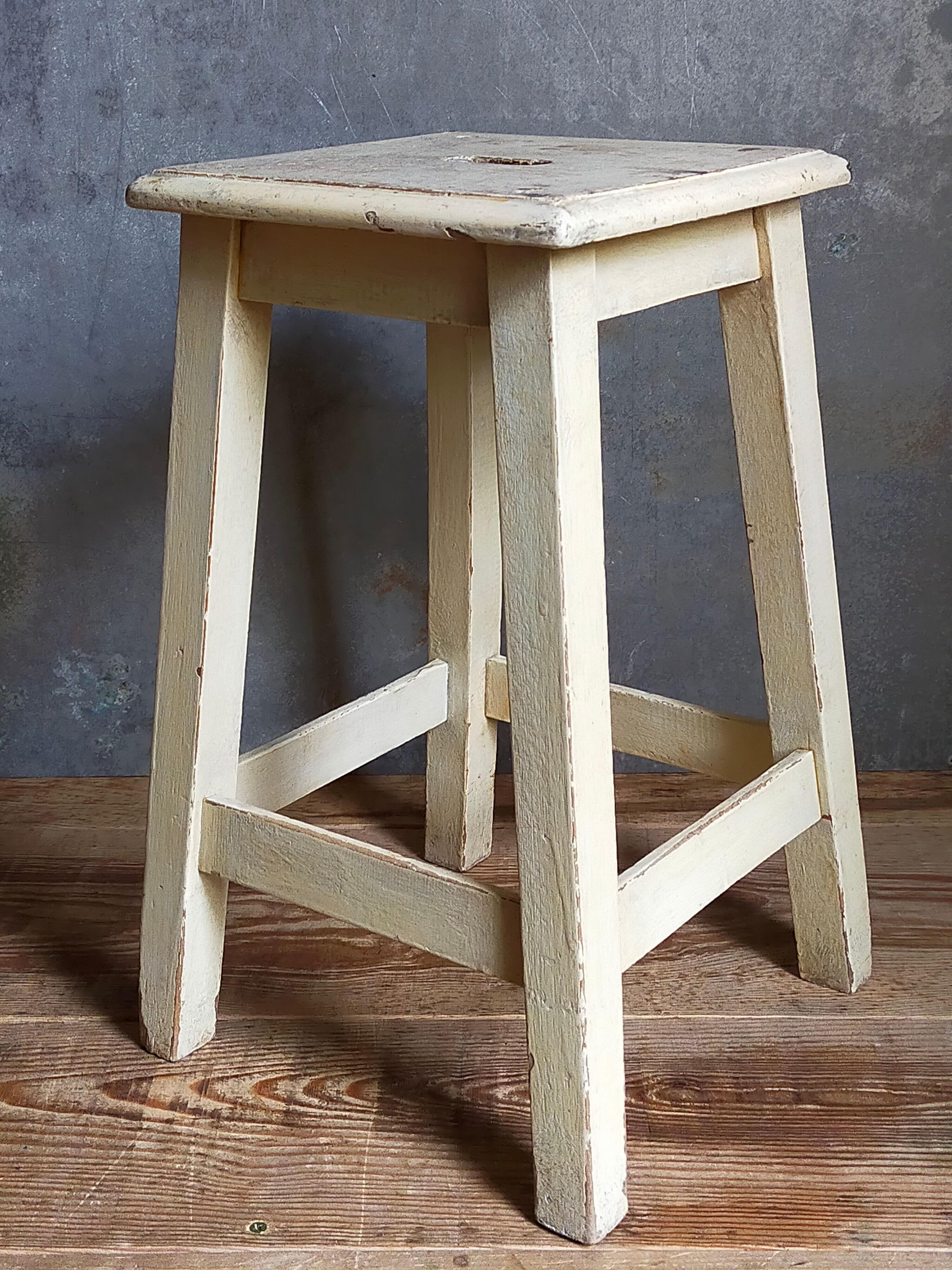 Wooden workshop stool with old patina