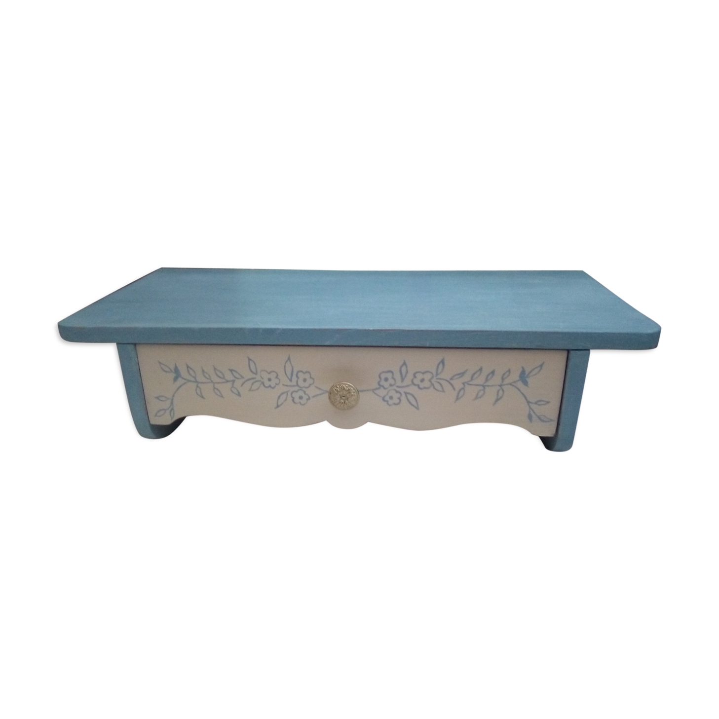 Old wooden shelf with drawer