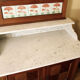 Vintage vanity toilet furniture with marble top.