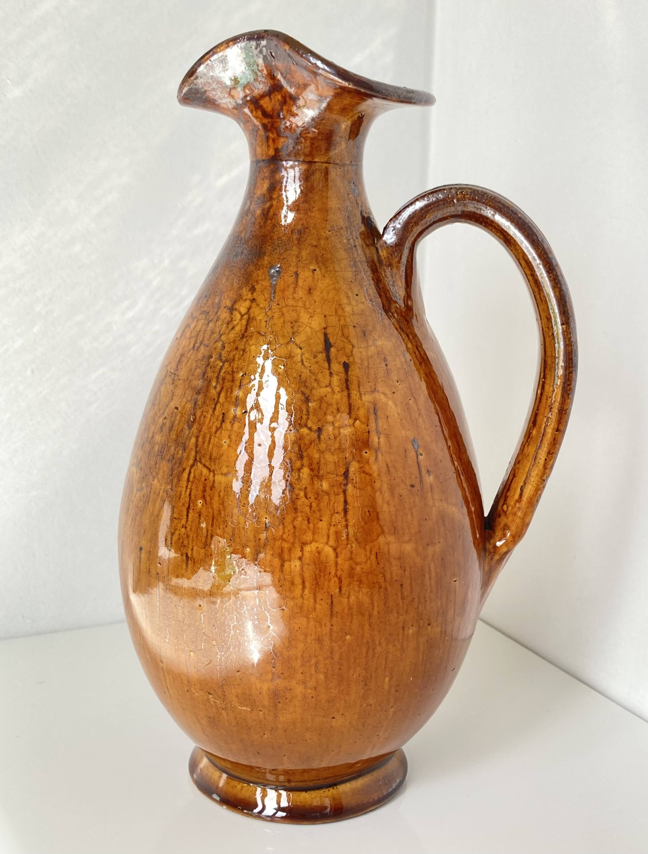 Jug, pitcher or carafe, white earthenware and alquifoux from Vallauris.
