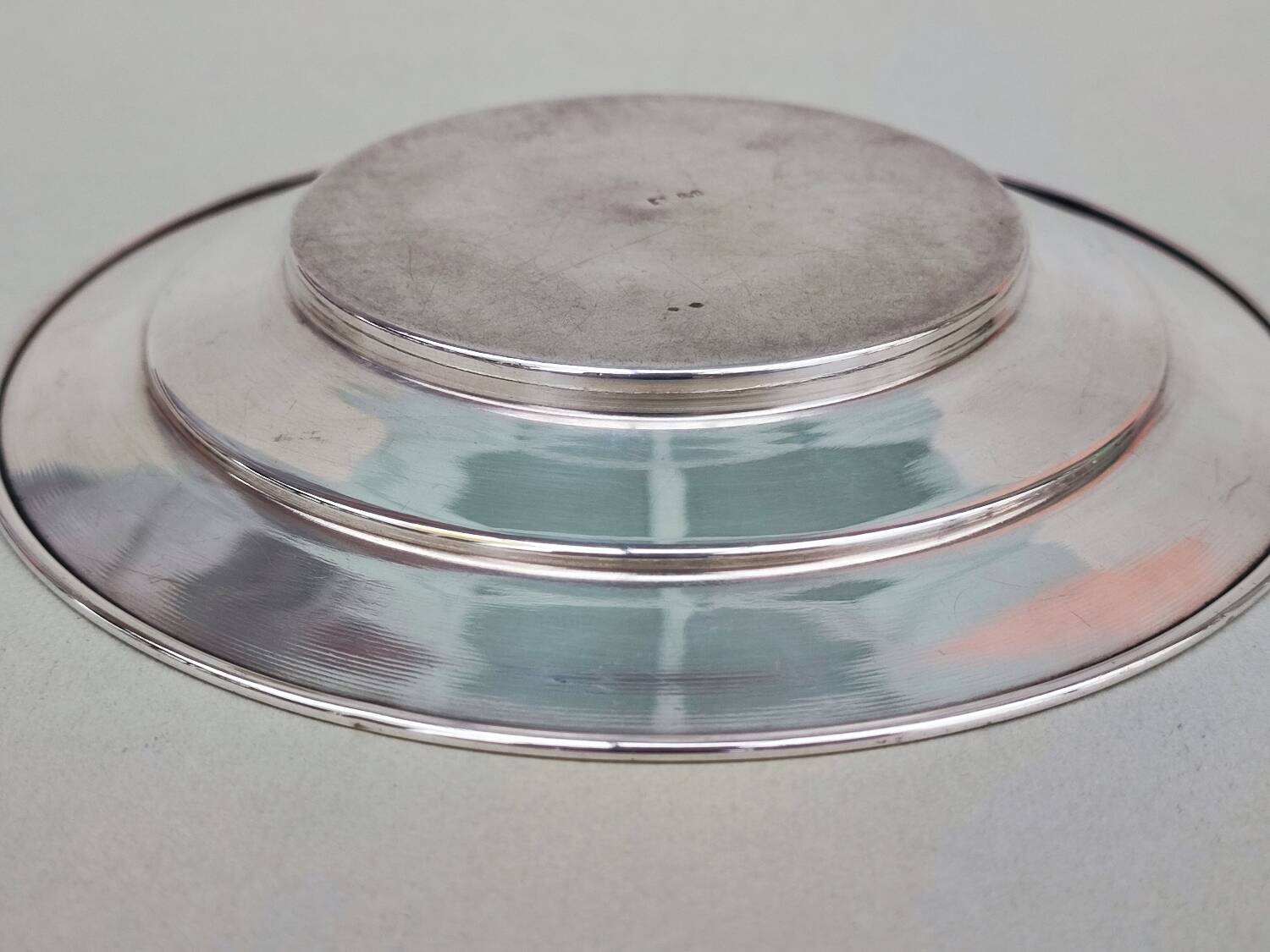 Trois sous-verres en métal argenté