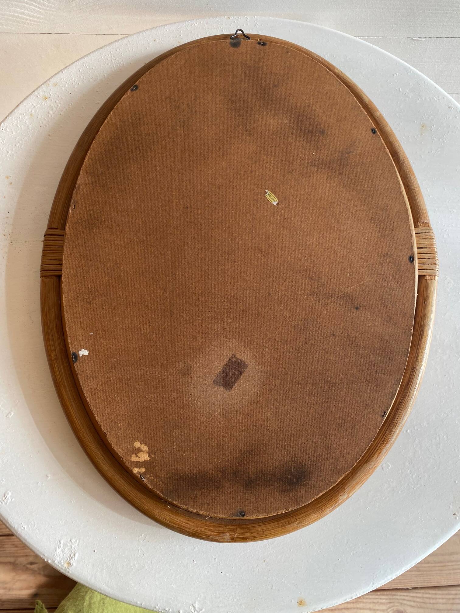Vintage oval rattan mirror