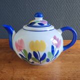 Antique teapot with flower pattern