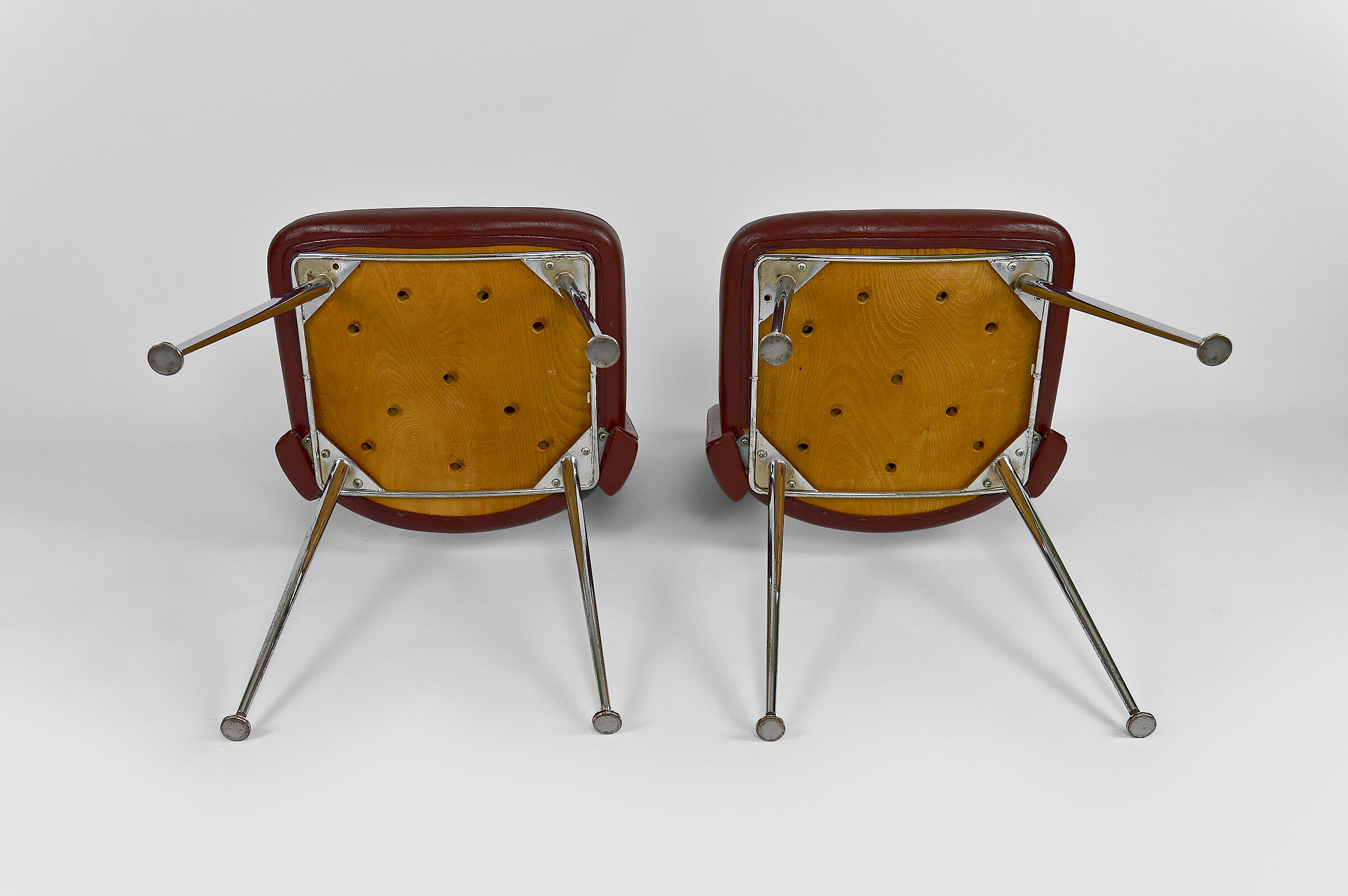 Pair of chairs in chrome and skaï, circa 1960
