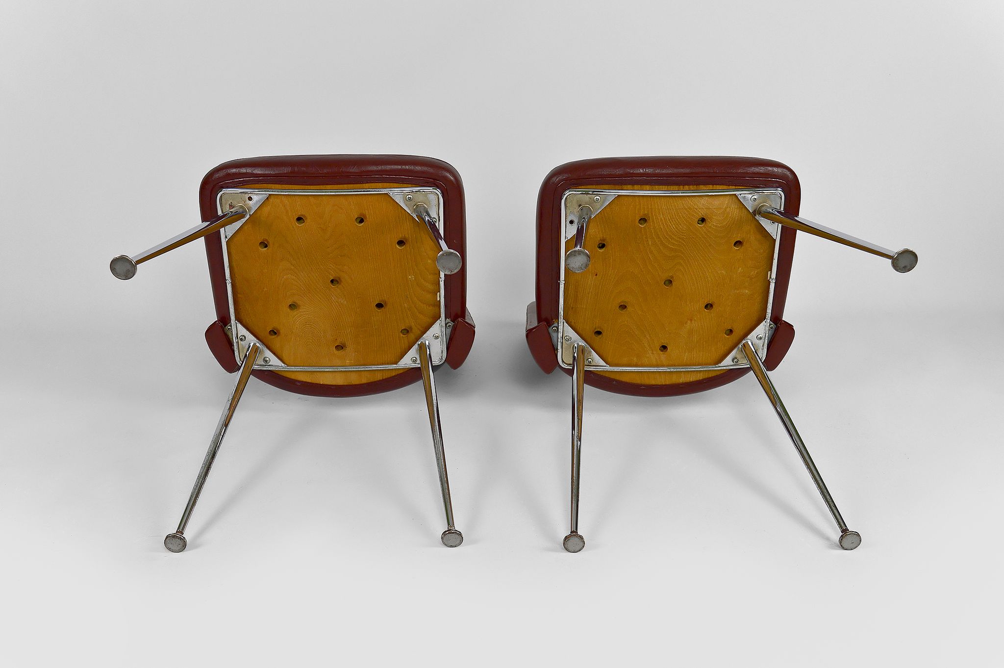 Pair of chairs in chrome and skaï, circa 1960