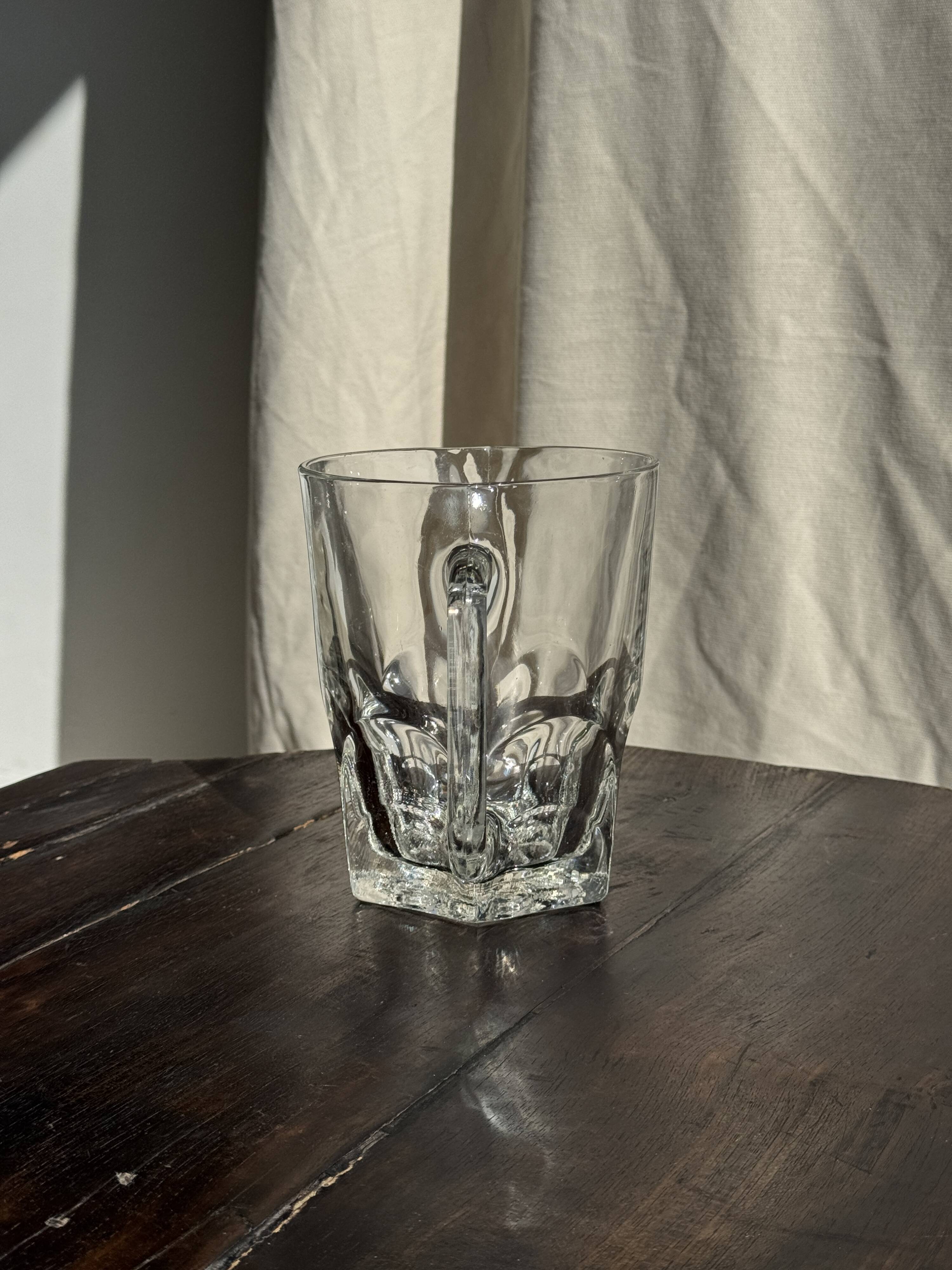 Large glass water jug with handle, hexagonal base, H15 D20.