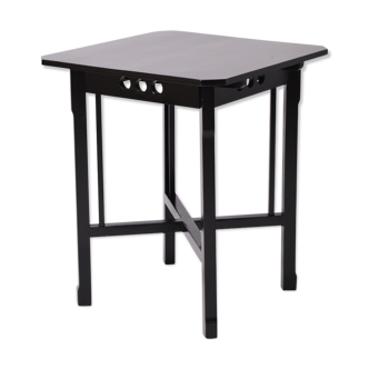 Modernist ebonised tea table, 1910