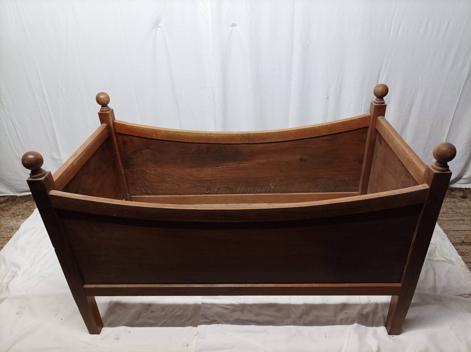Old wooden children's bed