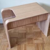 Boone coffee table in curved wood produced by Habitat, design