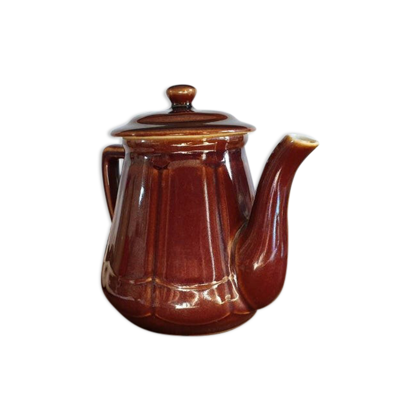 Vintage tea maker in old-fashioned country house-style earthenware