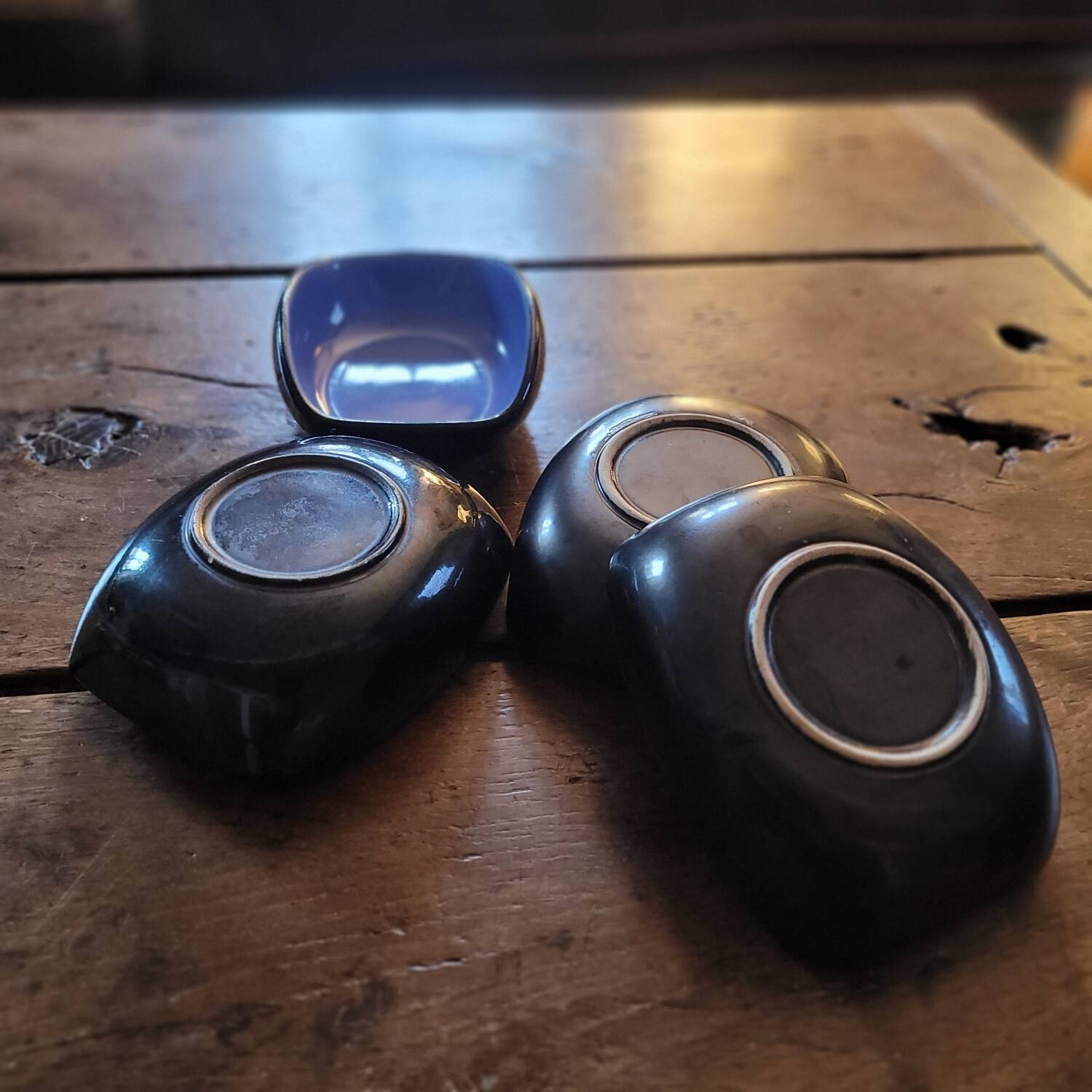 Set of 4 ceramic glazed multicoloured bowls/trinket dishes.