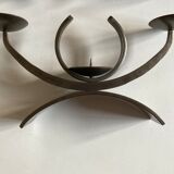 Pair of modernist candlesticks in beaten iron 1970