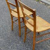2 solid wood and straw dining chairs