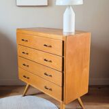 Vintage chest of drawers with tapered legs from the 1960s.