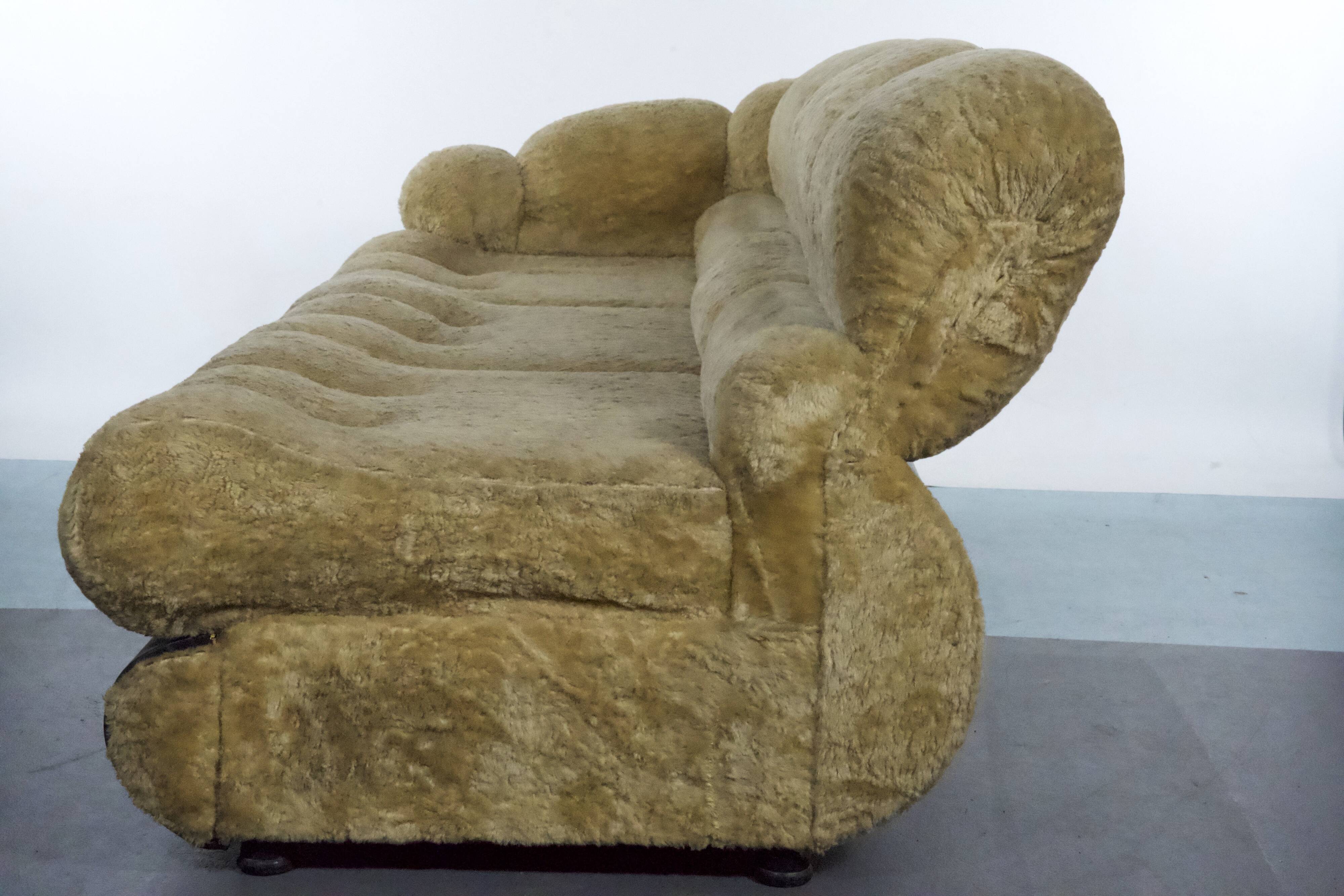 three-seater sofa designed by Adriano Piazzesi, produced in Italy during the 1970s. Upholster