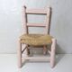 Old wooden straw chair for children